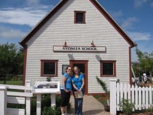 Mom and Hannah in front of the Avonlea one-room school house, which was once an actual school