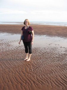 Hannah on the rippled sand